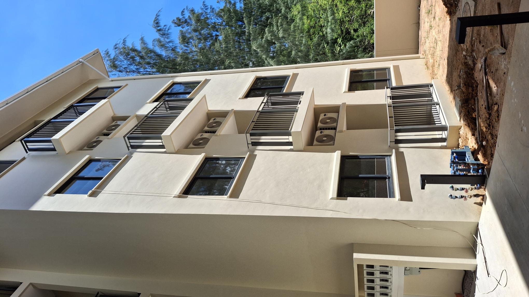 32 families receive keys to their new mid-range condominiums at Perseverance.