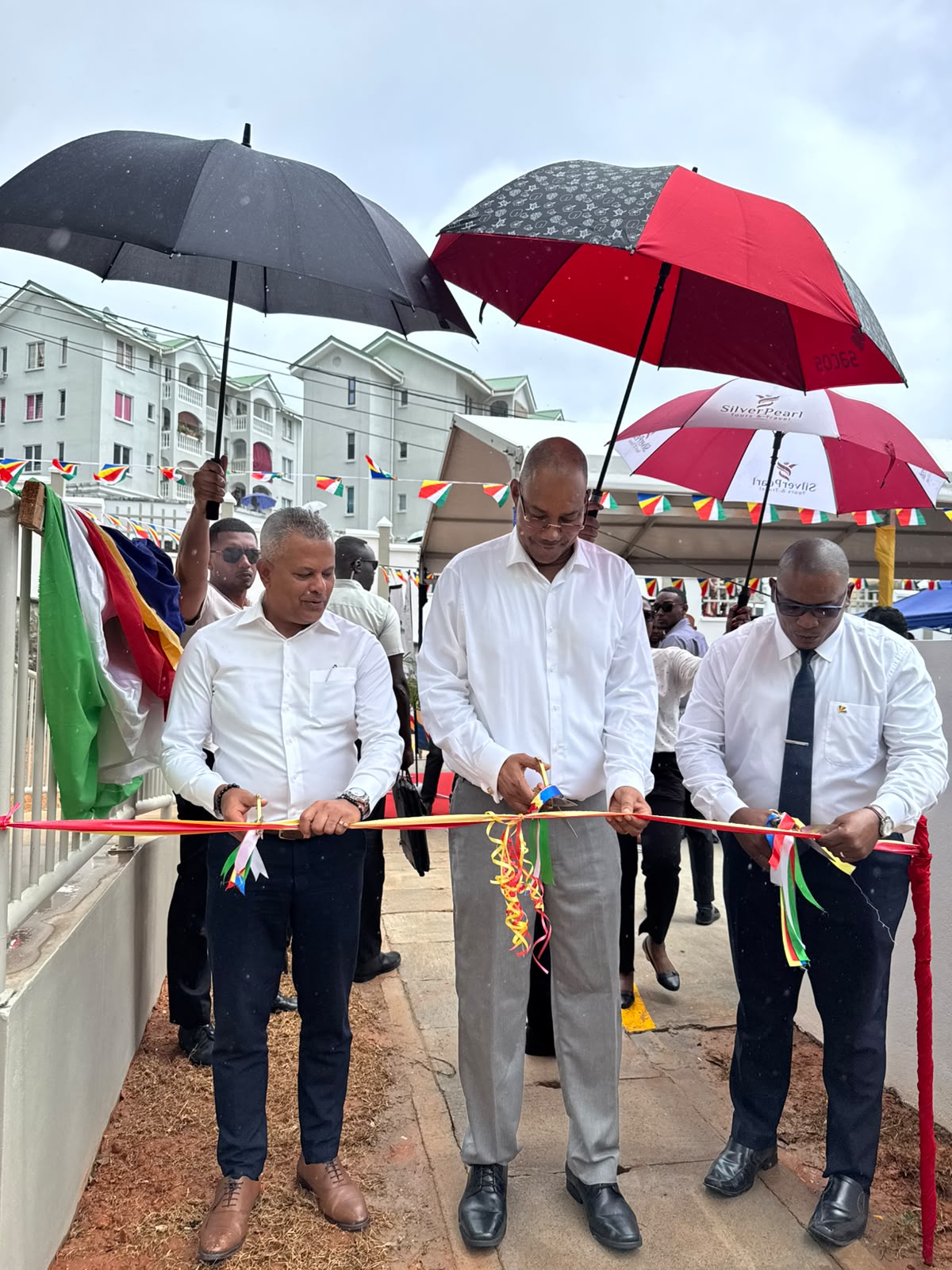 Sixteen families receive keys to new homes at Corgate Estate